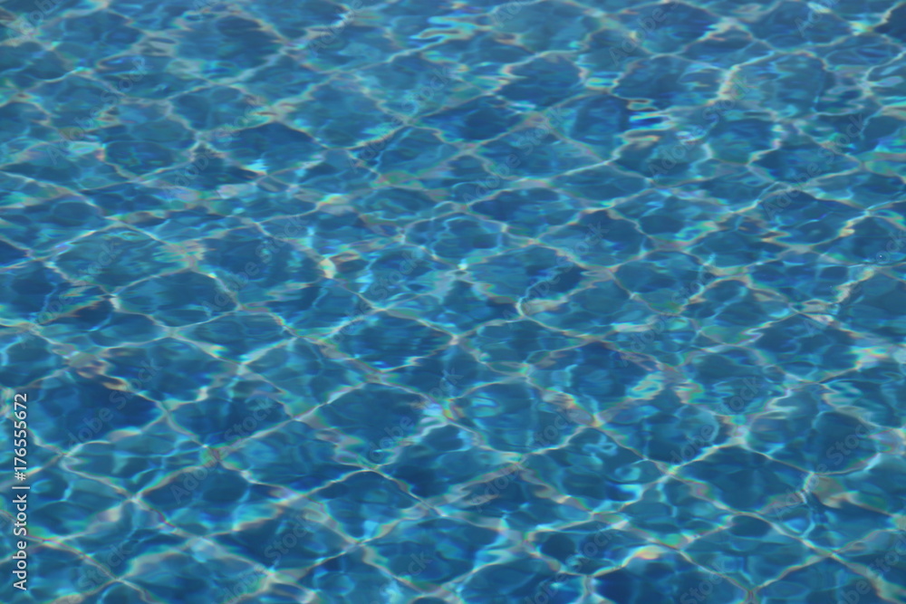 wave on the blue swimming pool