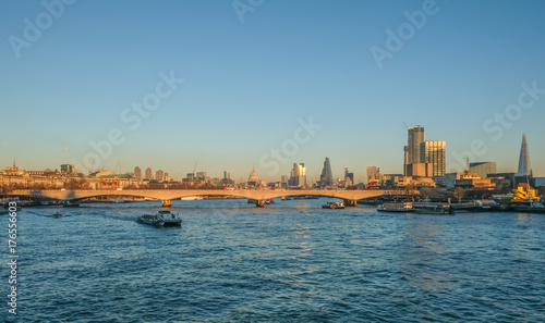London skyline view of Waterloo Bridge and the City and the south side of the River Thames. © jeancuomo