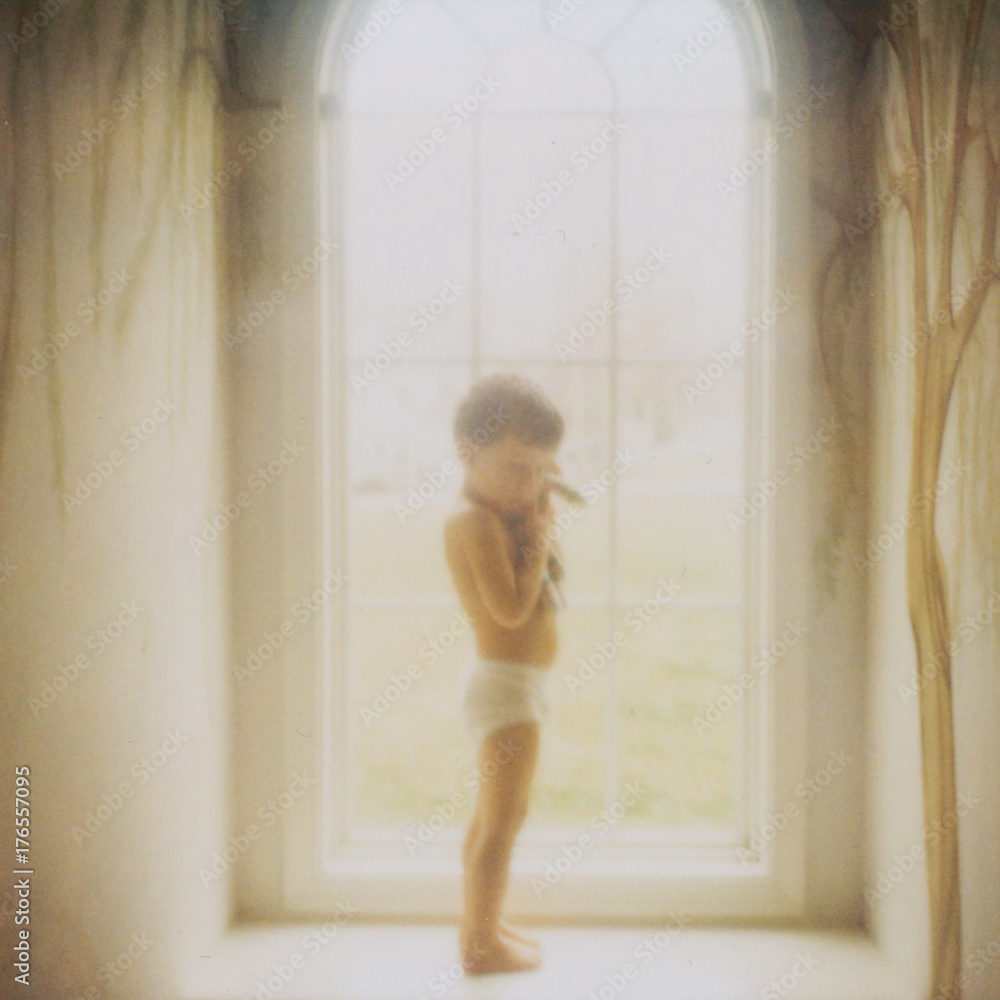 Boy in a window Boy in a window