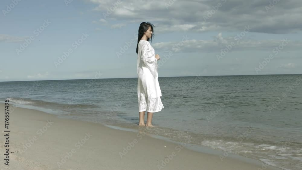 Woman looking at ocean view thinking about life Woman looking at ocean view thinking about life