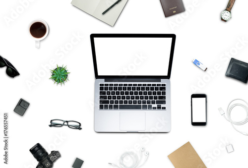Top view, Flat lay style, Travel set, Working desk, computer, laptop, smart phone, coffee, mug, glasses, notebook and a lot of things on pastel color background with clipping path.