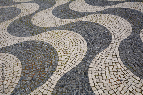 Detail of a cobblestone pavement - Lisbon, Portugal.