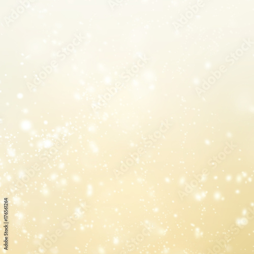 Gold christmas lights background with sparkling bokeh. Abstract defocused boke glittering shimmer.