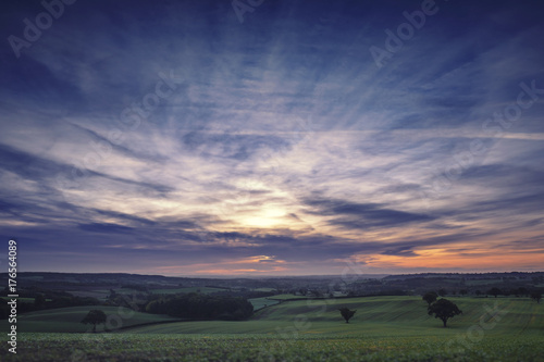 Colorful Sunrise Sky over British Fields in Autumn
