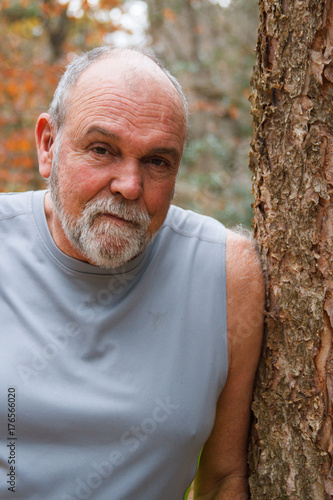 Man and Tree in Autumn Colors