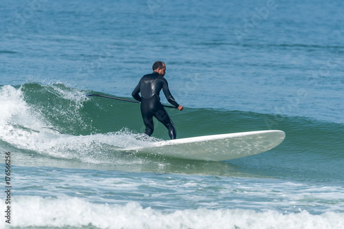 Stand up paddle surfer © homydesign