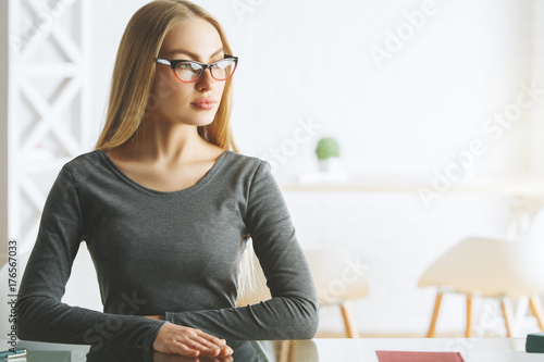 Thoughtful businesswoman at office desk