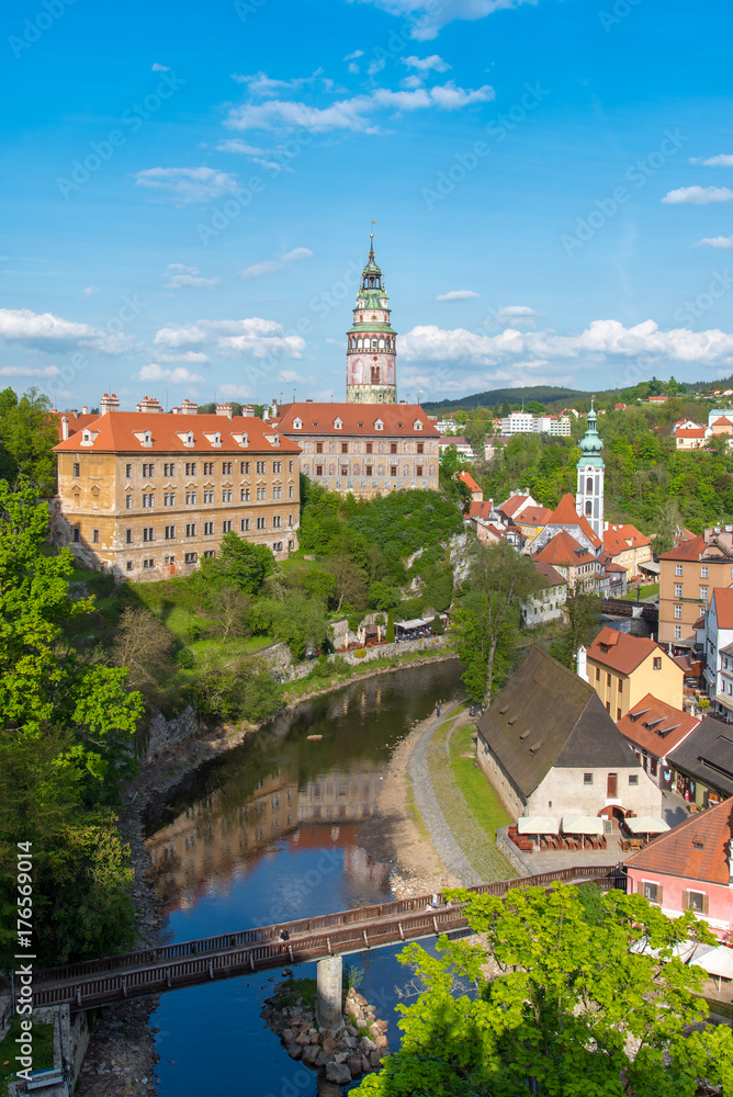 Cesky Krumlov in sunny day from above view with building reflection in the river