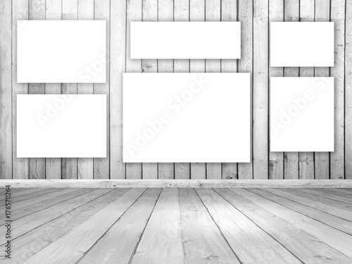 Fototapeta 3D wooden room interior with blank hanging canvases