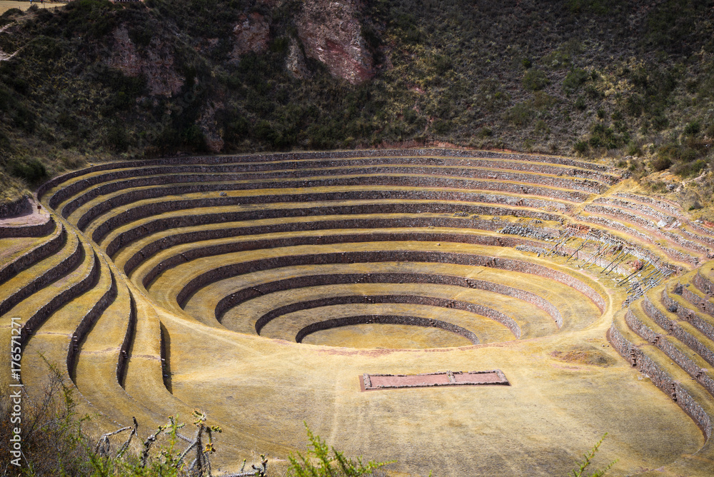 The archaeological site at Moray, travel destination in Cusco region and the Sacred Valley, Peru. Majestic concentric terraces, supposed Inca's food farming laboratory. The archaeological site at Moray, travel destination in Cusco region and the Sacred Valley, Peru. Majestic concentric terraces, supposed Inca's food farming laboratory.