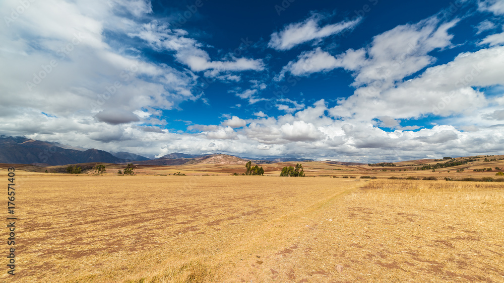 Expansive view of the Sacred Valley, Peru from Pisac Inca site, major travel destination in Cusco region, Peru. Dramatic sky. Expansive view of the Sacred Valley, Peru from Pisac Inca site, major travel destination in Cusco region, Peru. Dramatic sky.