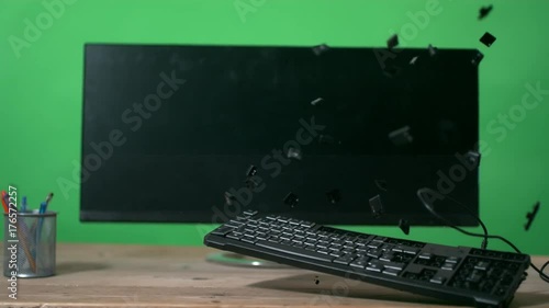  Unrecognizable angry businessman smashing computer keyboard slowmo