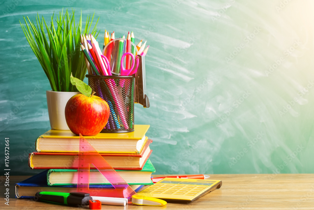 School supplies on the background of the school board