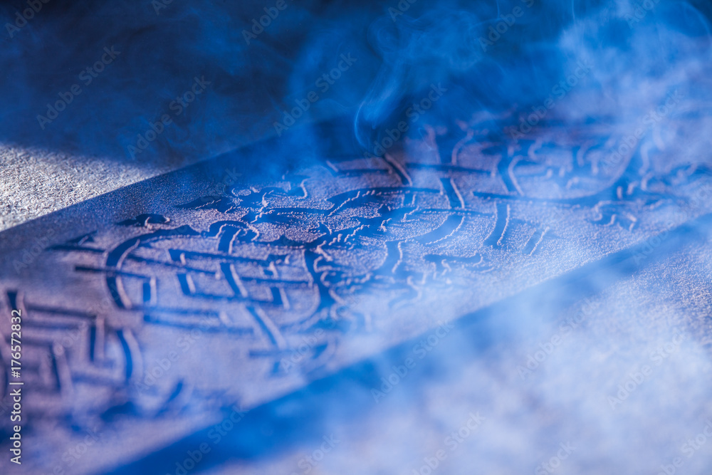 Fototapeta premium Laser makes engraving on leather belt 