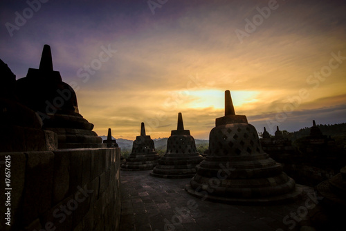 Silhouette stupas of Borobudur during sunset, Yogyakarta, Central Java, Indonesia.