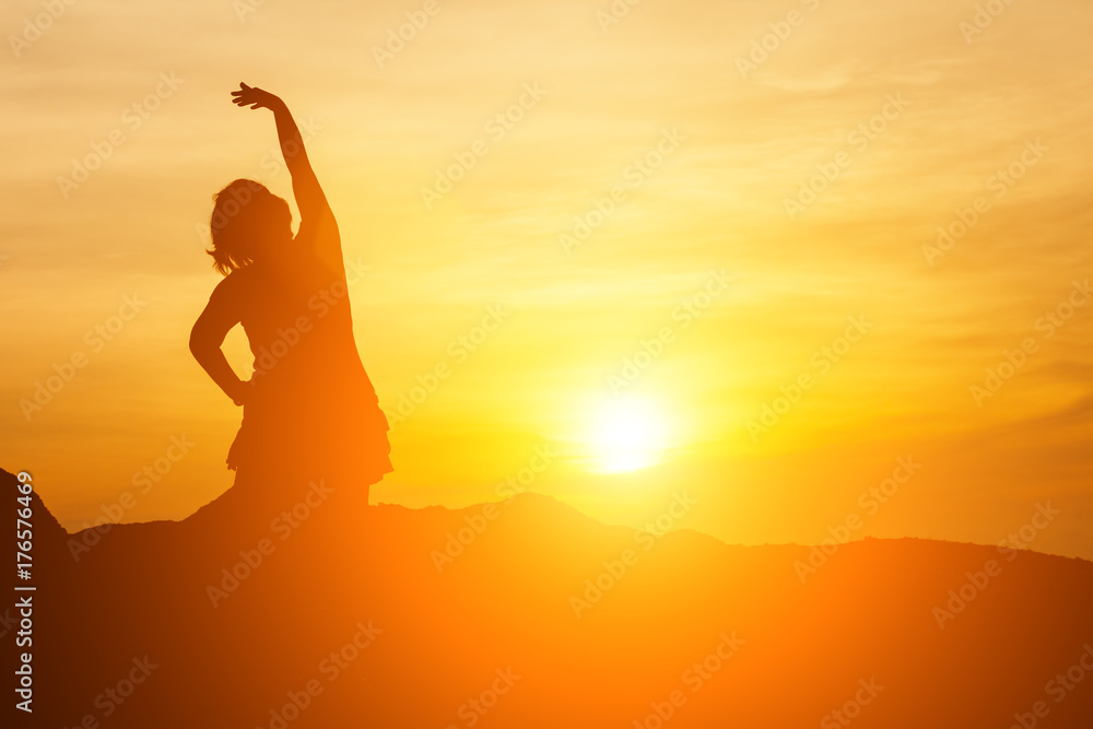 Silhouette of happy woman