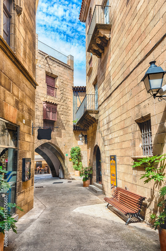 Fototapeta Naklejka Na Ścianę i Meble -  Scenic alley inside Poble Espanyol, Barcelona, Catalonia, Spain