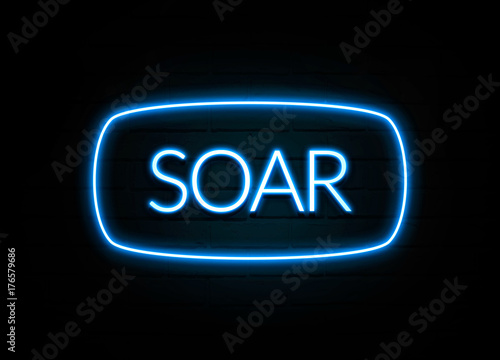 Φωτογραφία Soar  - colorful Neon Sign on brickwall