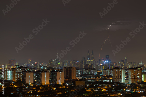 Canvas Print Lightning during thunderstorm over downtown Kuala Lumpur, Malaysia