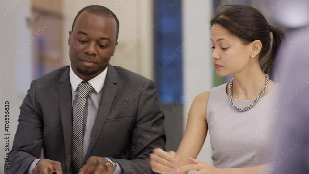 Corporate business team negotiating in a meeting Corporate business team negotiating in a meeting