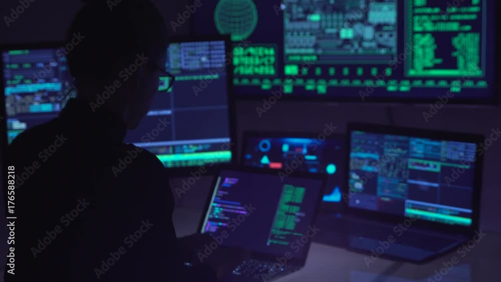 Hacker coding in cyberspace, typing on laptop. Highly skilled computer expert. Hacker coding in cyberspace, typing on laptop. Highly skilled computer expert.