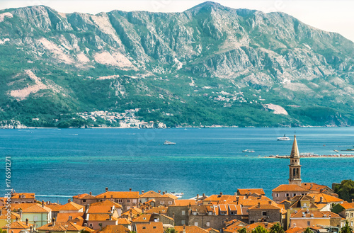 City of Budva  Montenegro. A view of the roofs of the houses of the old town  the mountains and the Adriatic Sea.