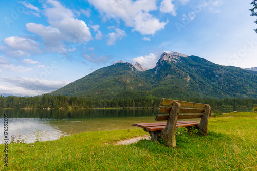 bench at lake in bavarian alps