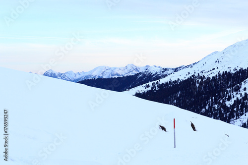 Mountain panorama with snow and sunrise in winter in Stubai Alps, Austria