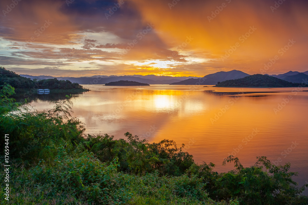 Sunset light, Hill, lake and reflection over the Dam, Keang Krachan Dam,  Petchaburee, Thailand.