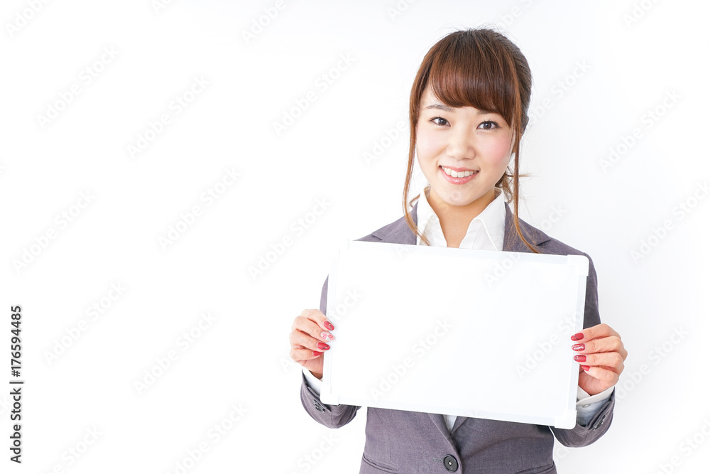 Business woman having a white board Business woman having a white board