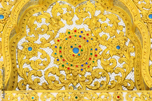 Pattern of flower gold wall stucco carved