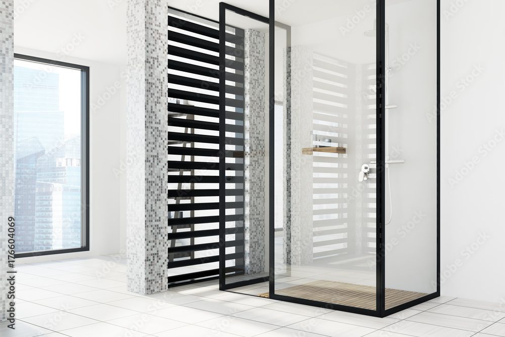 White tiled bathroom, glass shower, side White tiled bathroom, glass shower, side