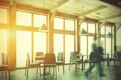 Wooden cafe interior, windows side toned