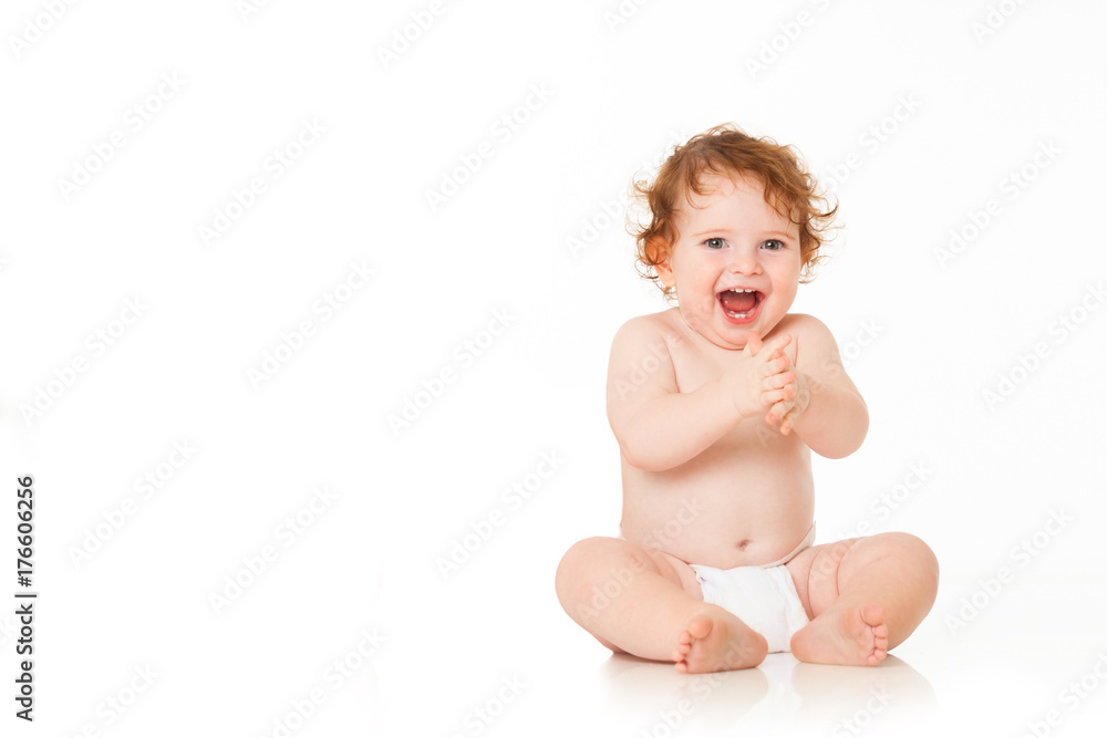 Happy baby boy is sitting on white background Happy baby boy is sitting on white background