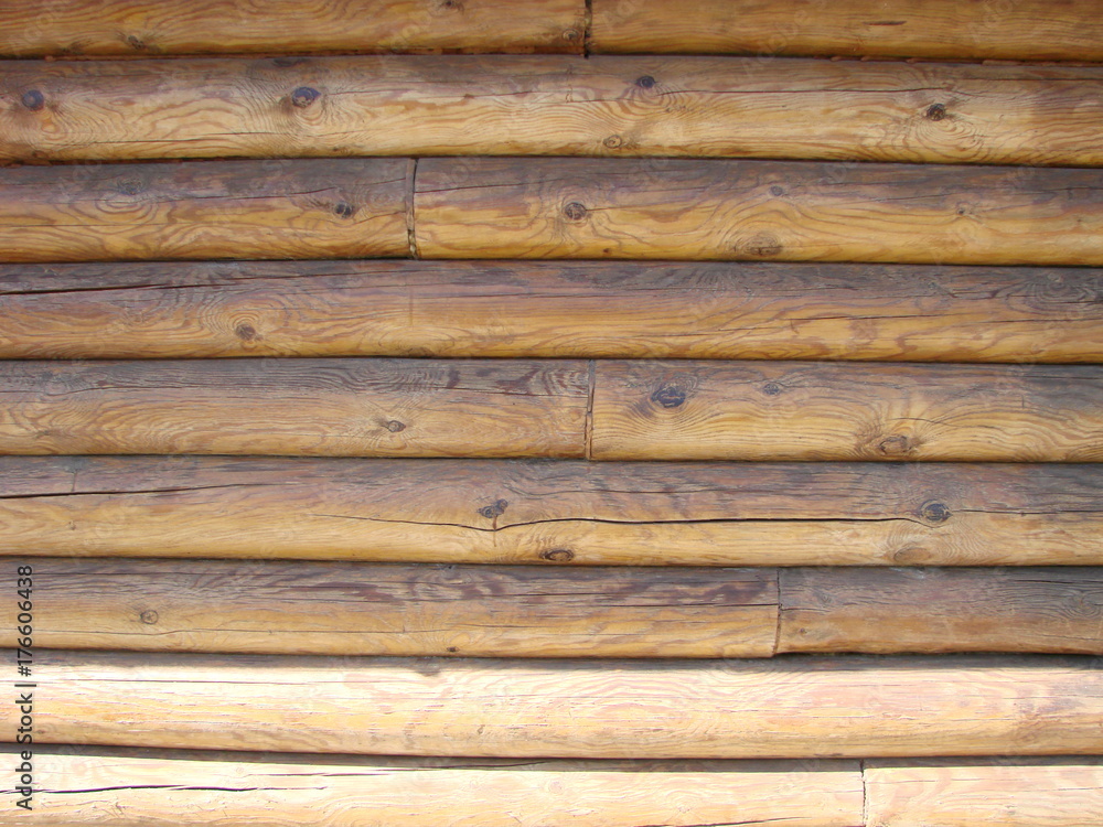 Obraz premium Shield with a large number of parallel wooden logs texture