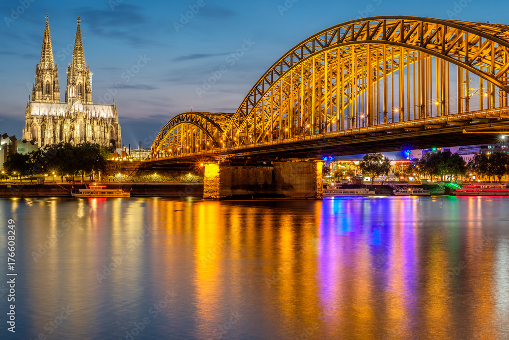 Cologne Cathedral and Hohenzollern Bridge at night, Germany