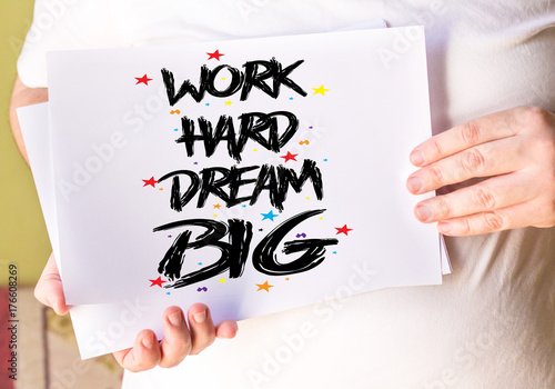 work hard, dreambig, on whit paper photo