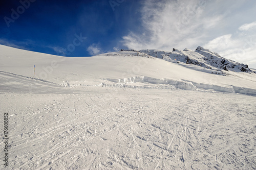 Alpine winter mountain landscape. French Alps with snow.