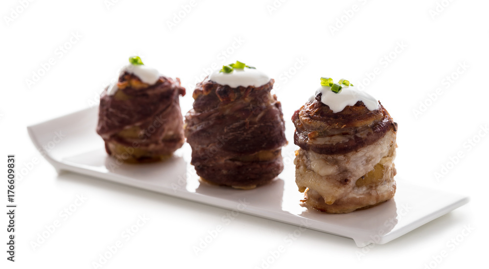 potato wrapped in bacon baked with cheese potato wrapped in bacon baked with cheese