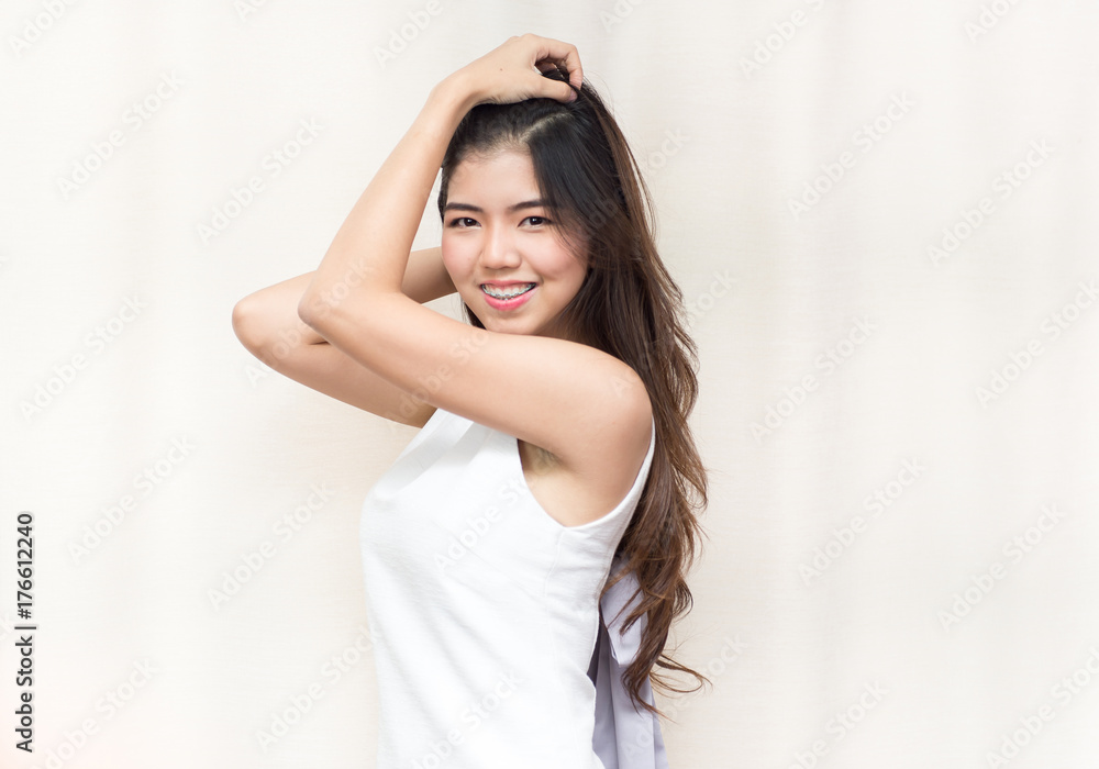 Portrait young Asian pretty business woman smiling and sleek hair, looking camera,close up Portrait young Asian pretty business woman smiling and sleek hair, looking camera,close up