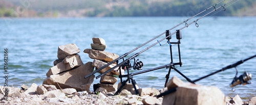 carpfishing with fishing rods on the lake photo