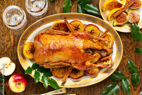 Festive Christmas duck baked with apples and figs.
