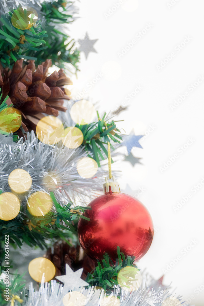 Fototapeta premium Christmas red giftbox ornametn ball decorate on pine tree copy space blur background for Xmas New Year festival.