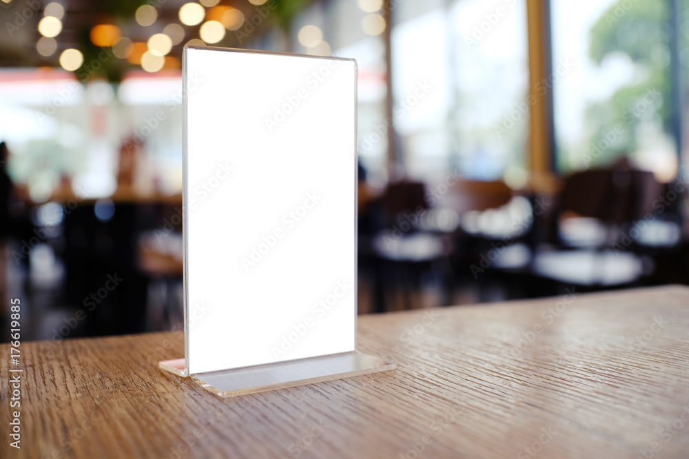 Mock up Menu frame standing on wood table in Bar restaurant cafe. space for text Mock up Menu frame standing on wood table in Bar restaurant cafe. space for text
