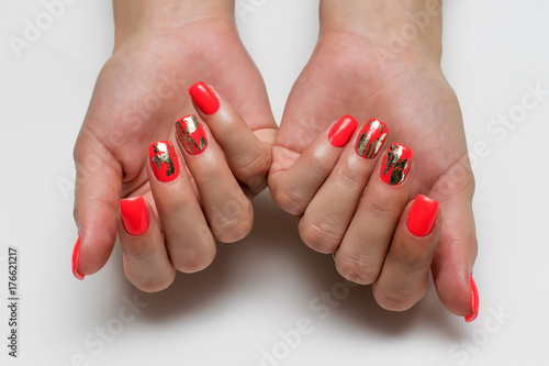 coral, red manicure on long square nails with gold foil inserts  photo