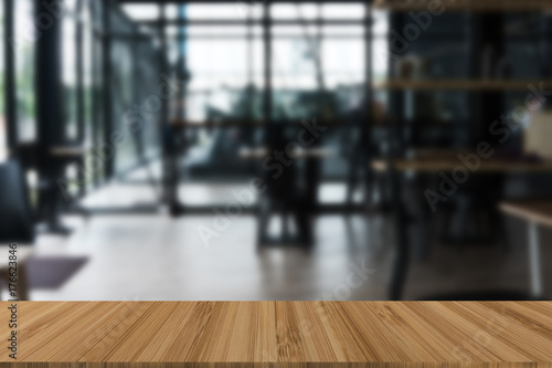 Wallpaper Mural table and chair in food court, cafe, coffee shop, restaurant interior with wood table for montage or display your product Torontodigital.ca