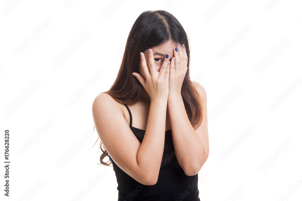 Beautiful young Asian woman peeking through fingers. Beautiful young Asian woman peeking through fingers.