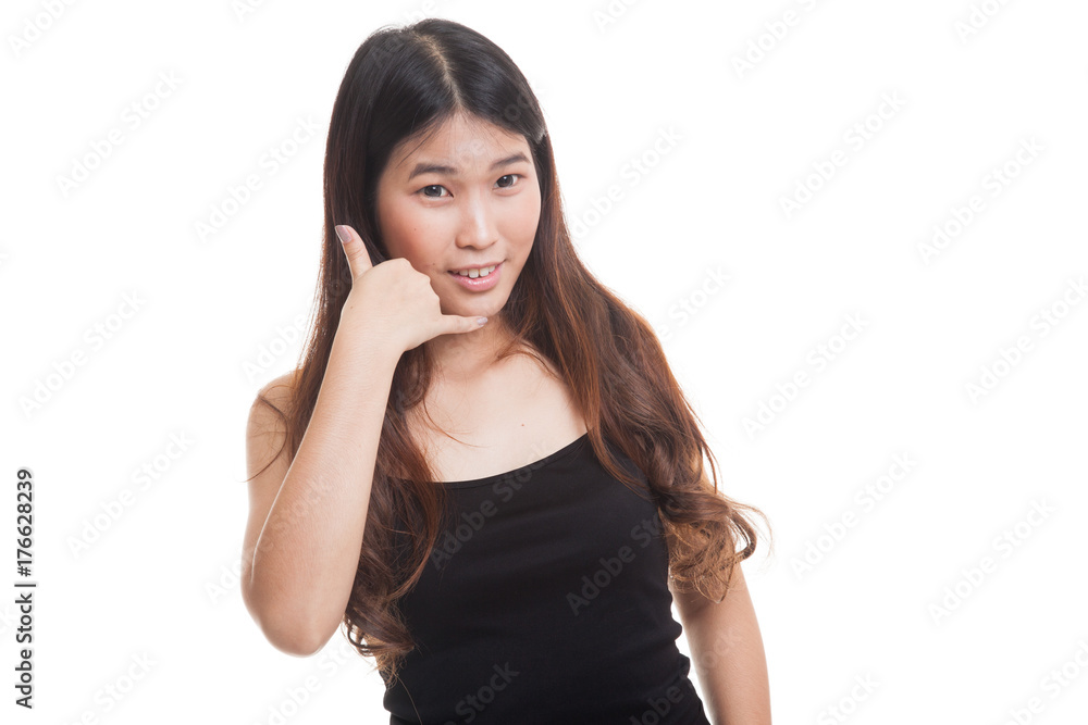 Young Asian woman show with phone gesture. Young Asian woman show with phone gesture.