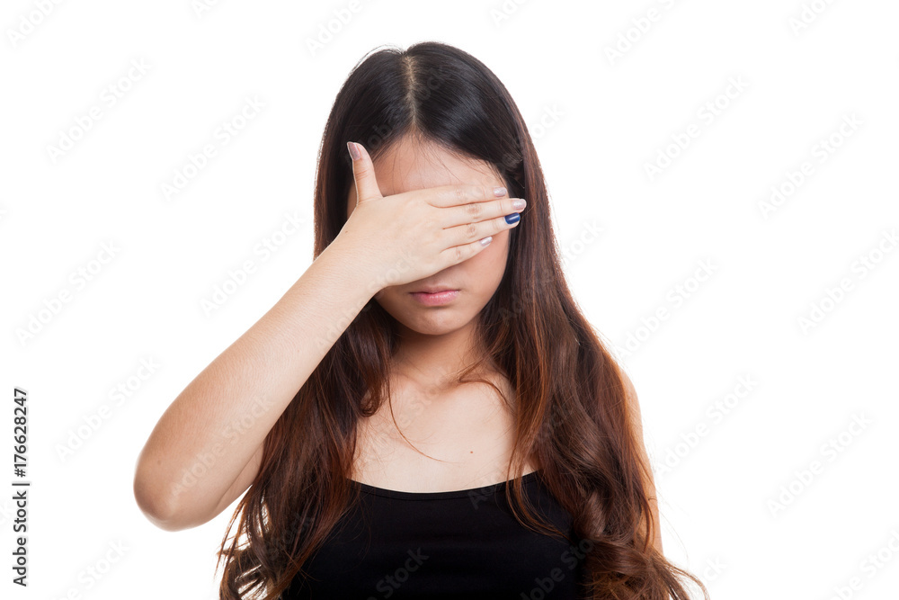 Young Asian woman close her eyes with hand. Young Asian woman close her eyes with hand.