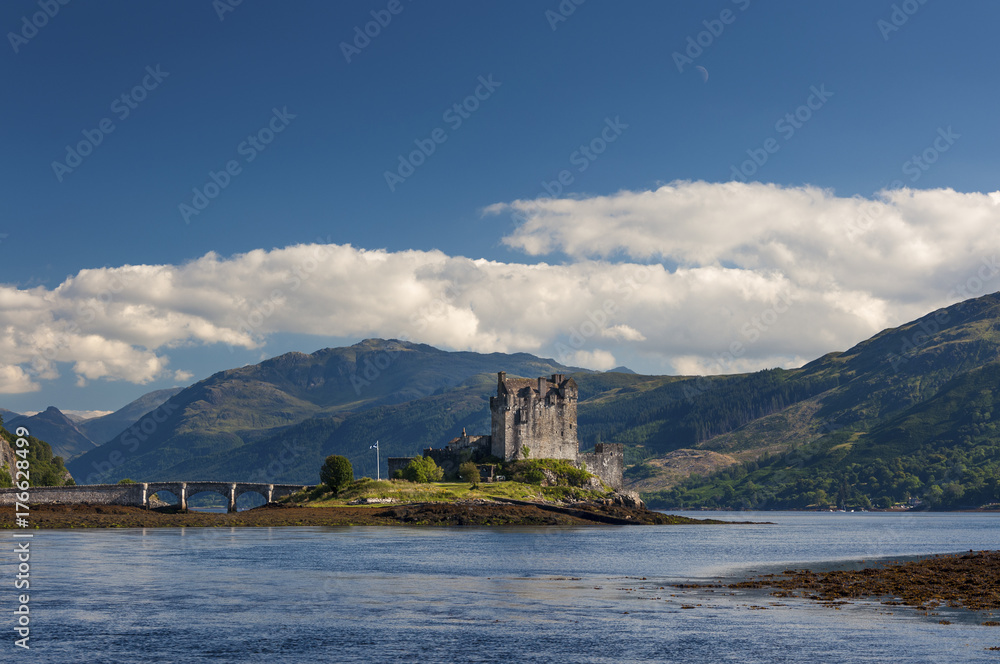View of the Eilean Donan Castle in the Highlands of Scotland, United Kingdom; Concept for travel in Scotland